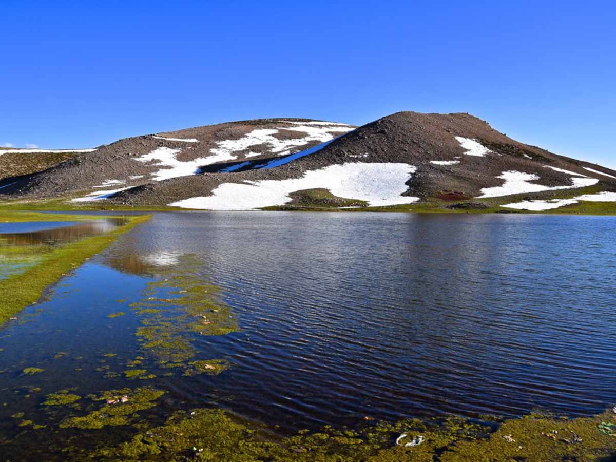 A kasbah perched on the edge of a red-rock gorge in the Atlas Mountains.
